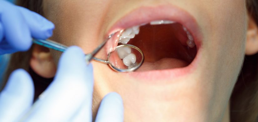 Close up woman getting a dental treatment