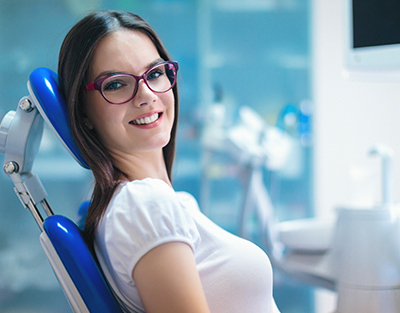 woman smiling at the dentist